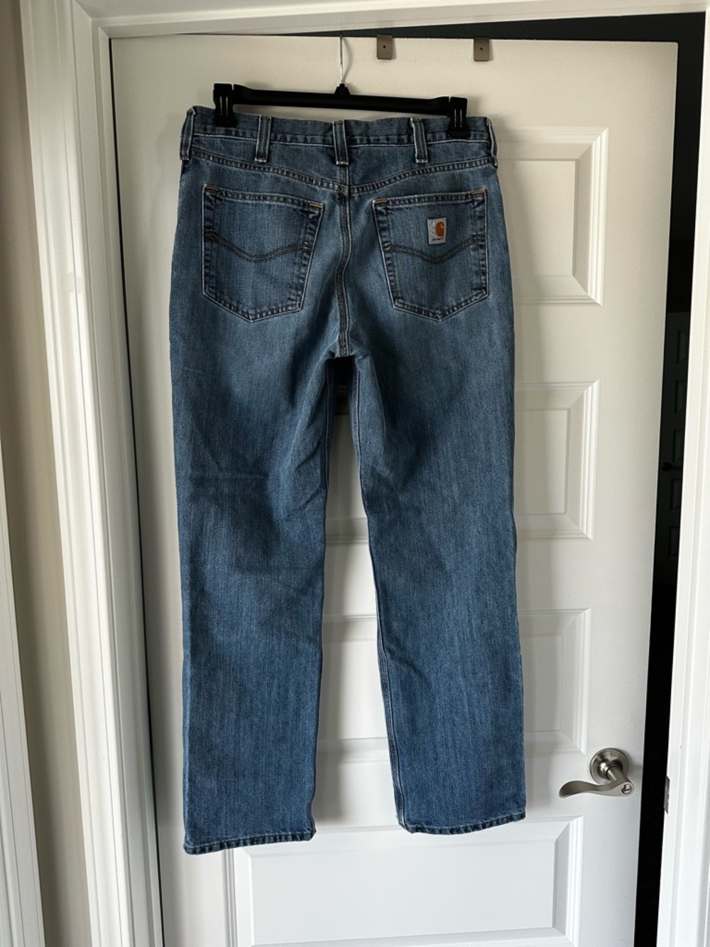 Carhartt Men’s Bootcut Denim Jeans in Light Blue Wash